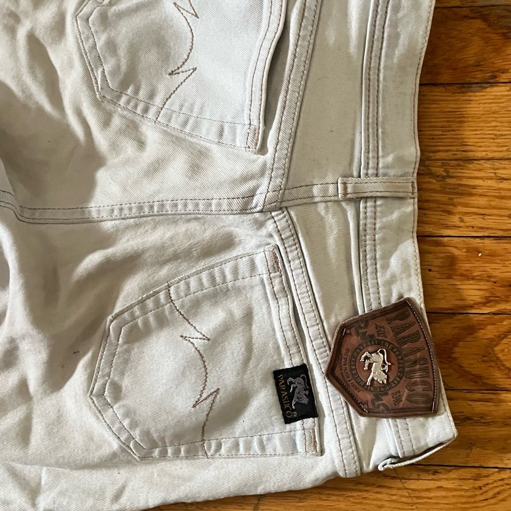 Blue-white 1990’s Parasuco high waisted Jeans with Leather Patch detail